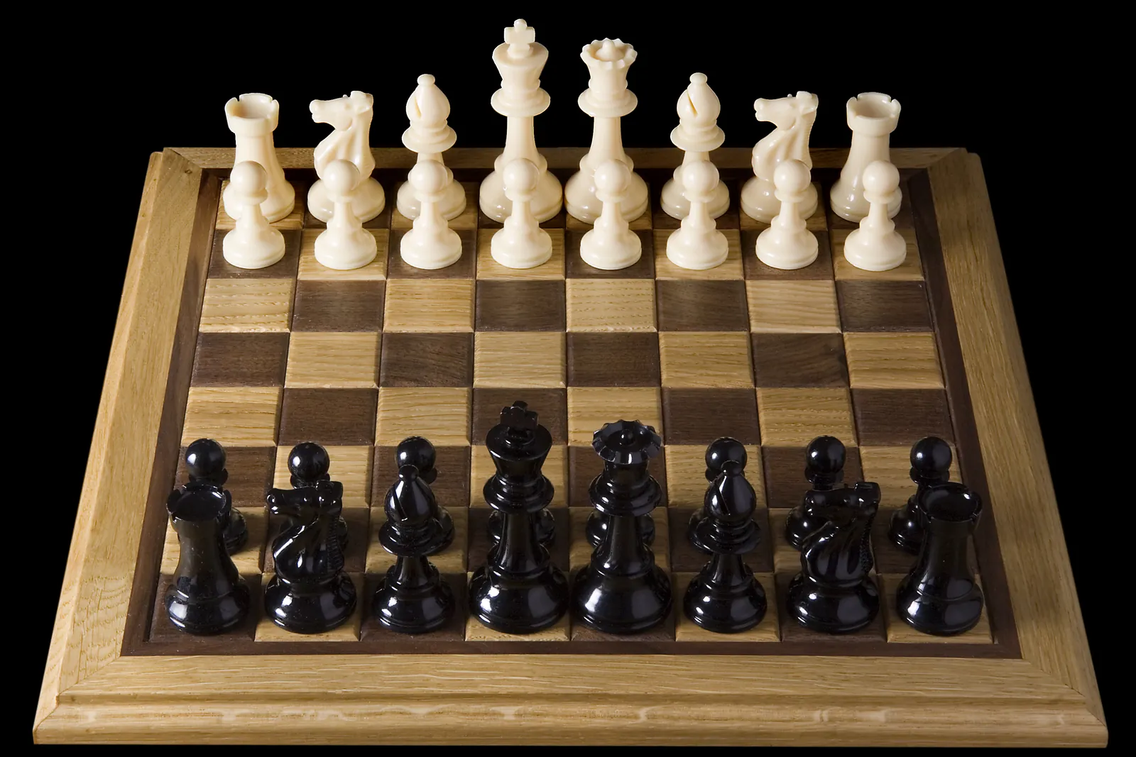 A chessboard set up in the opening position for training